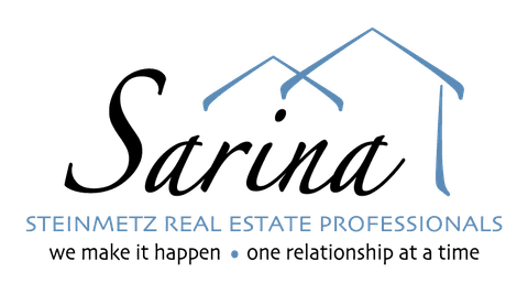 Sarina Steinmetz personal logo — Steinmetz Real Estate Professionals script wordmark over blue house rooflines